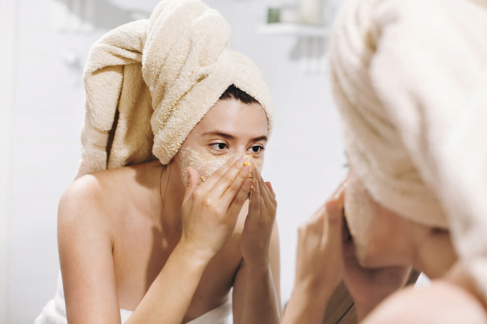 Woman exfoliating