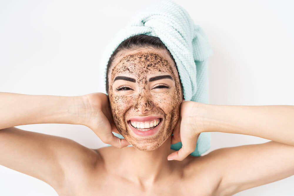 Woman exfoliating