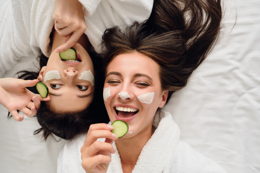 two women doing skincare