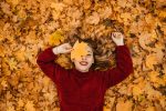 woman fall leaves